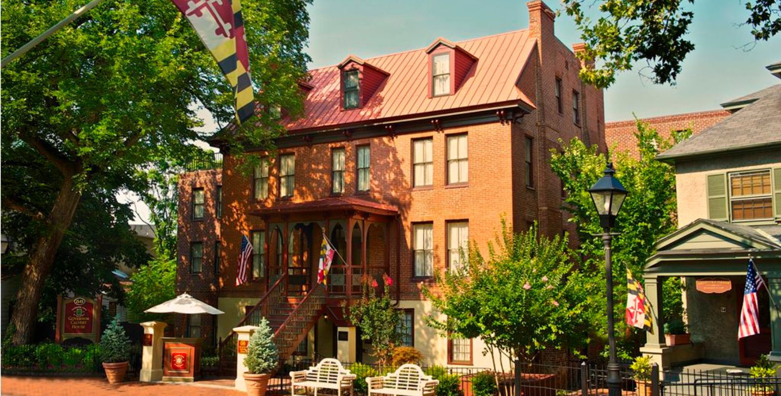 a brick building with a red roof