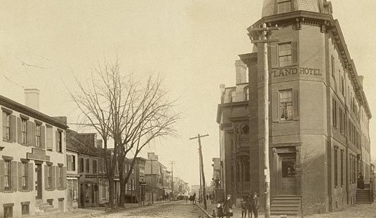 a street with buildings and people on it