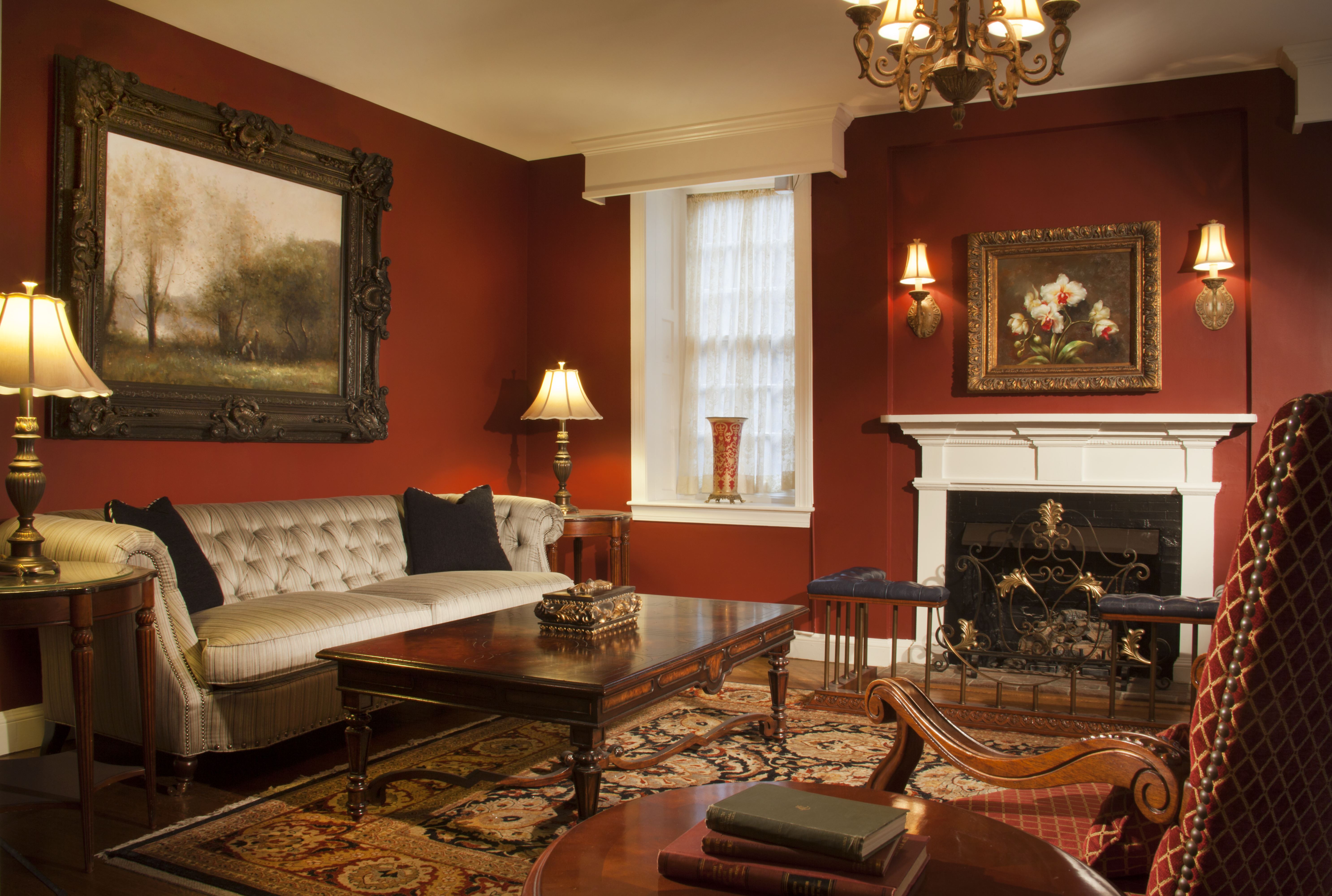 a living room with a fireplace and a couch