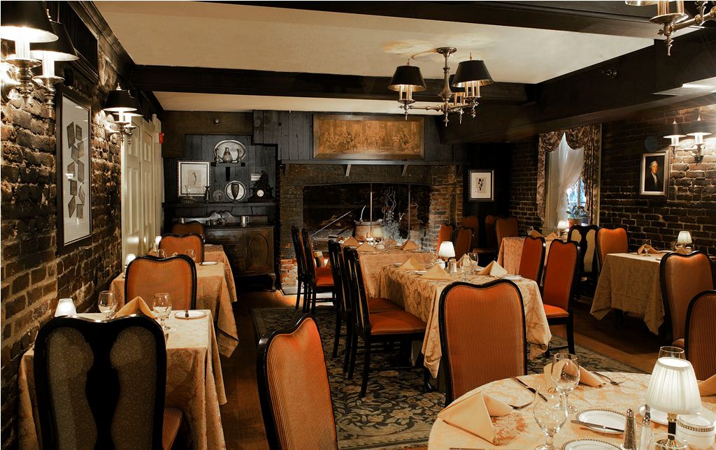a restaurant with tables and chairs