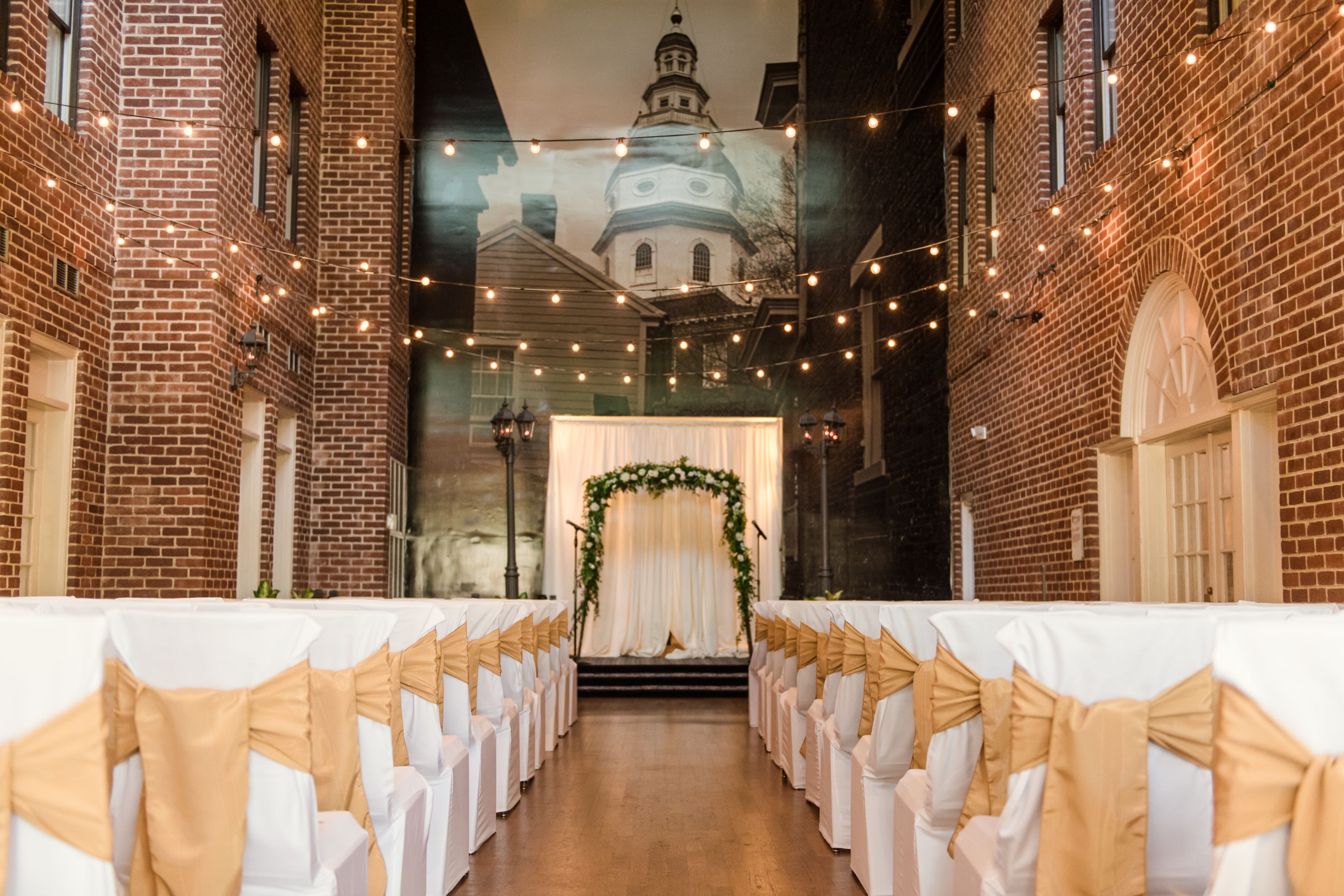 a room with chairs and lights