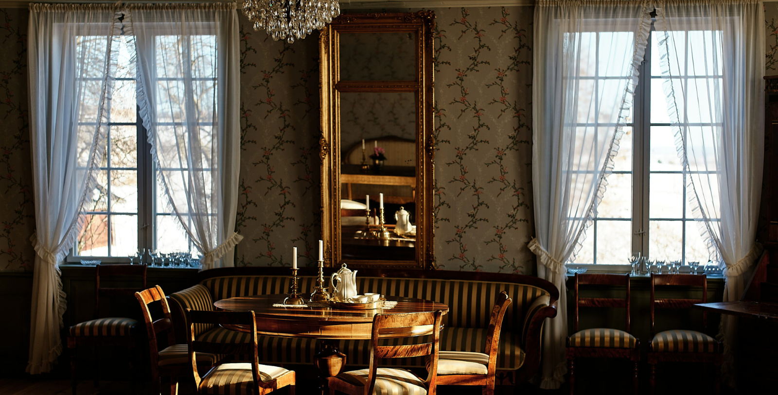 a room with a mirror and a table