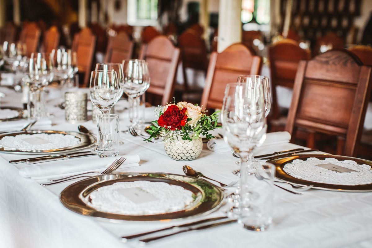 a table set with plates and glasses