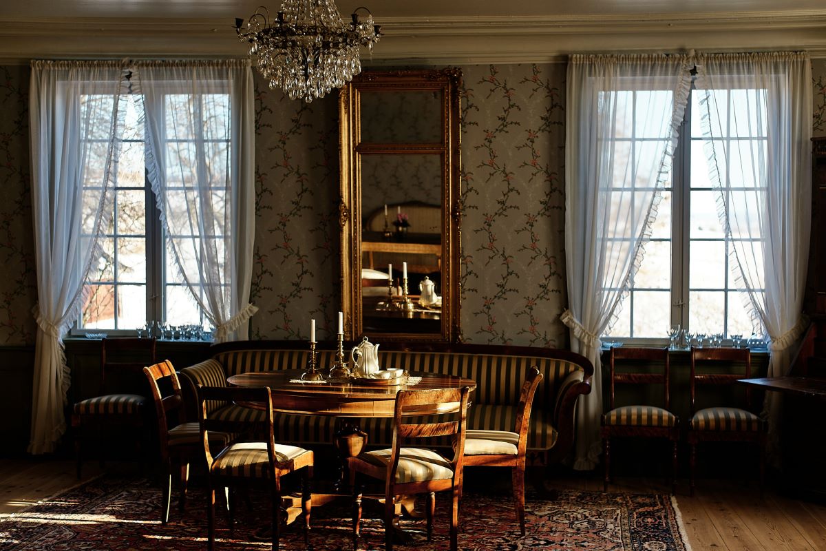 a room with a table and chairs