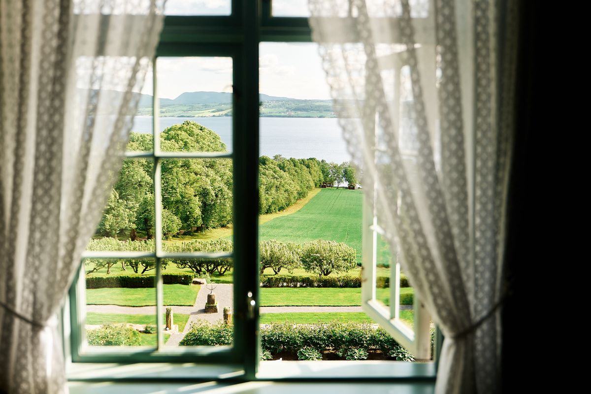 a view of a lake from a window