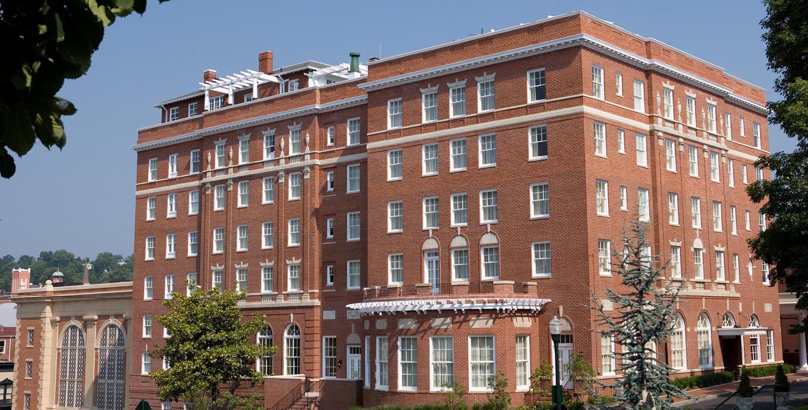 a large brick building with white trim