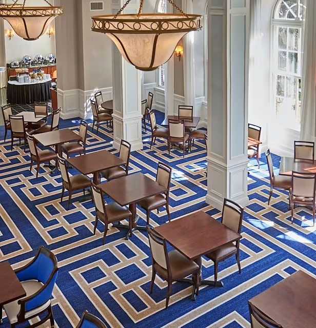 a room with tables and chairs