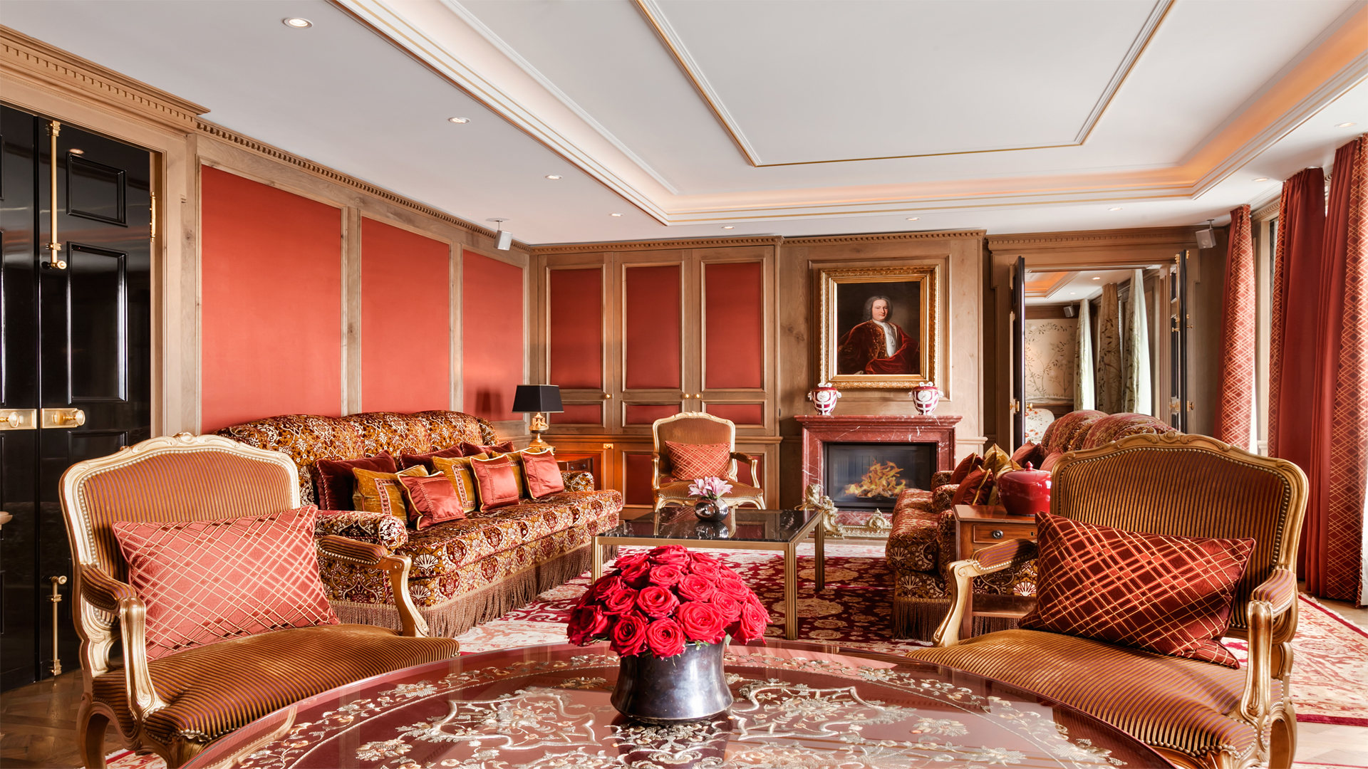 a room with a fireplace and couches
