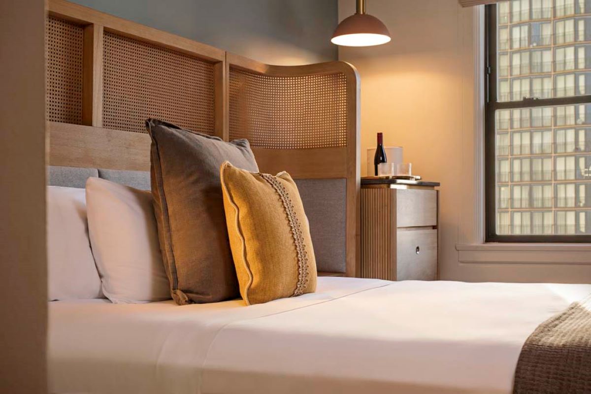 a bed with pillows on it