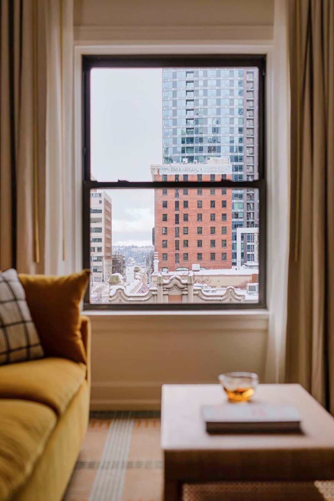 a window with a view of a city