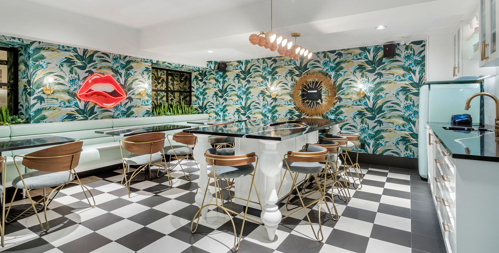 a room with a bar and chairs