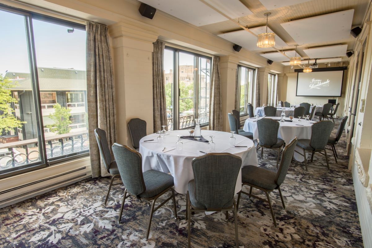 a room with tables and chairs