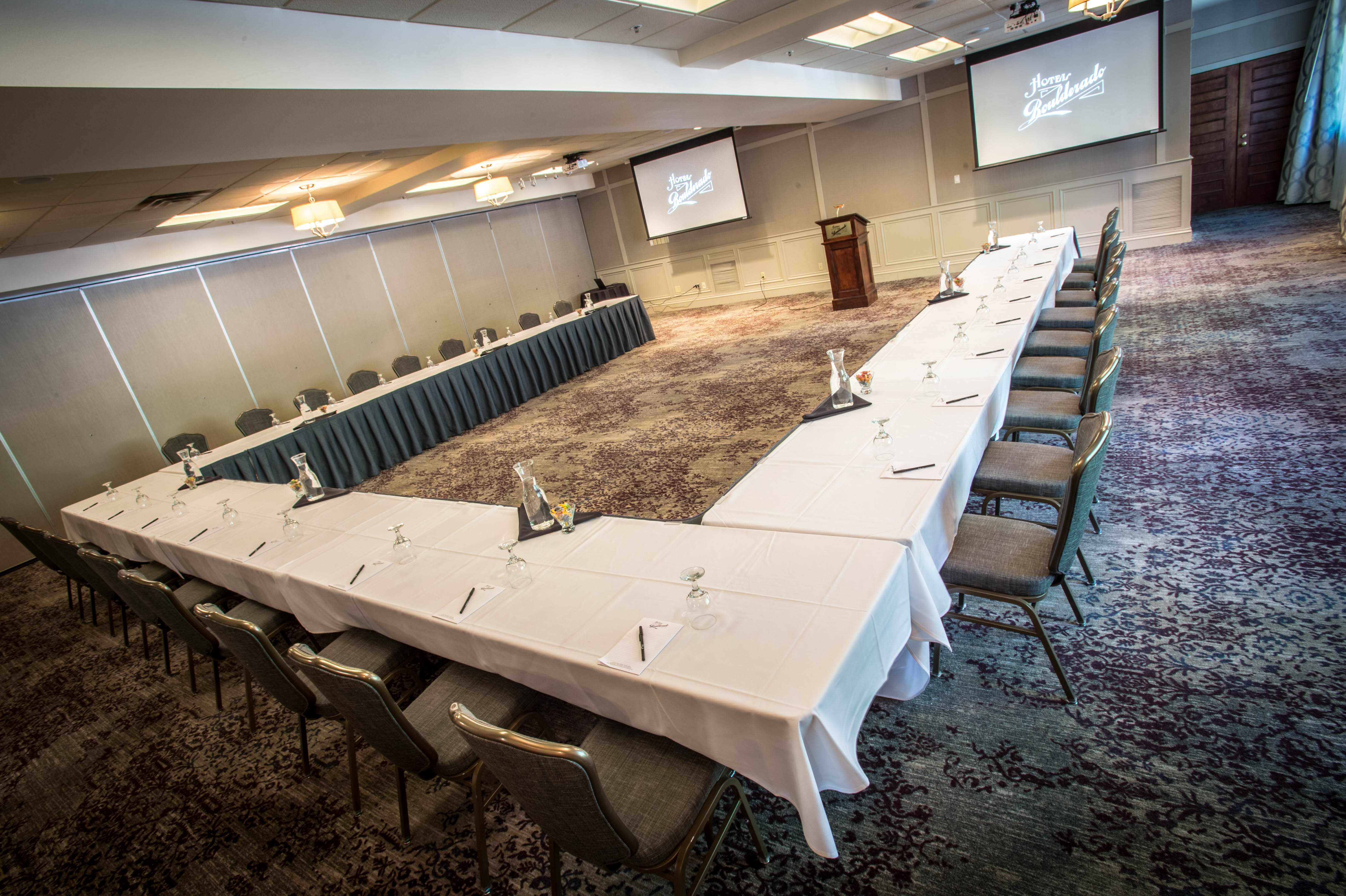 a large room with a large table and chairs