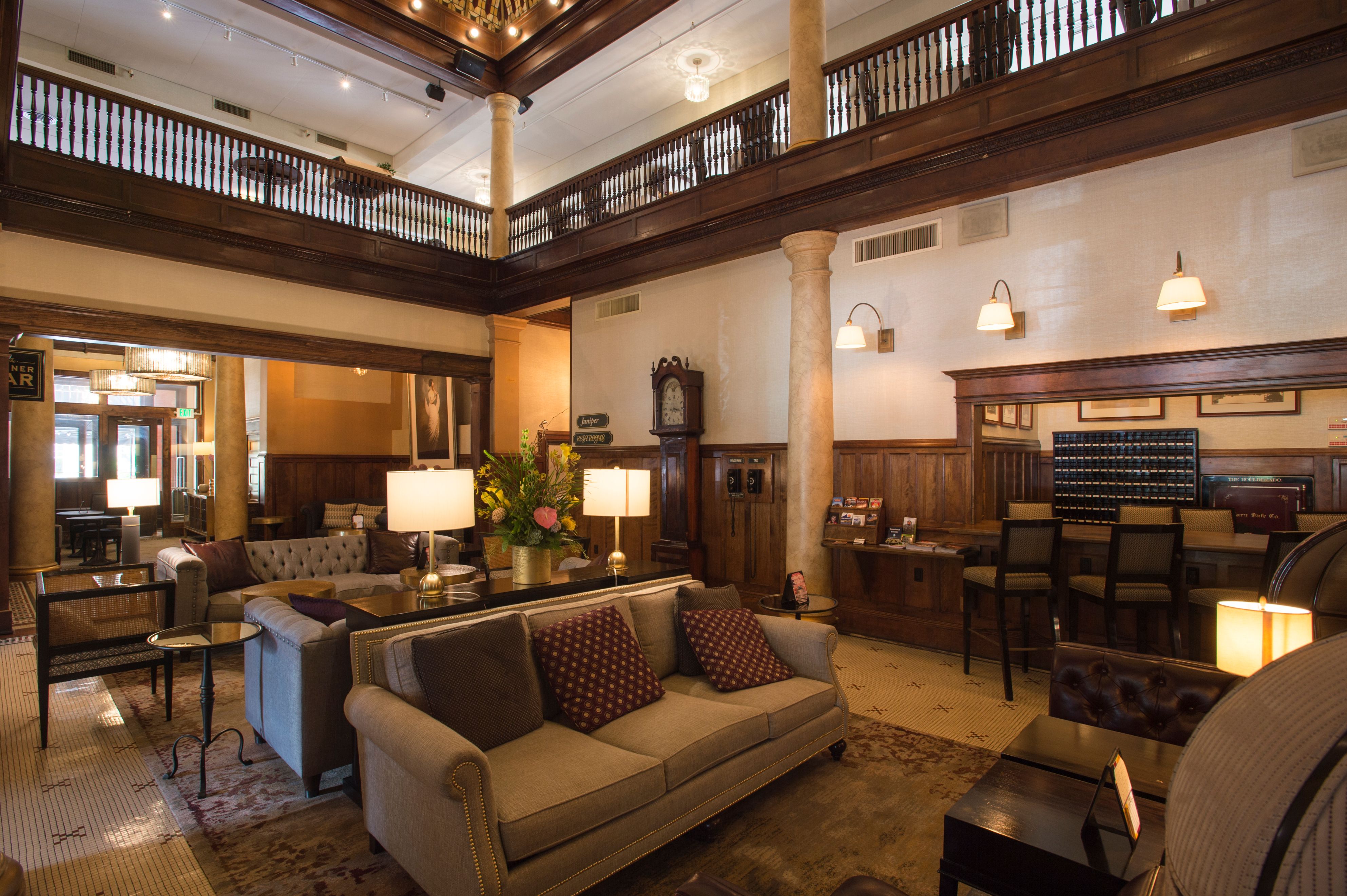 a room with a couch and a clock