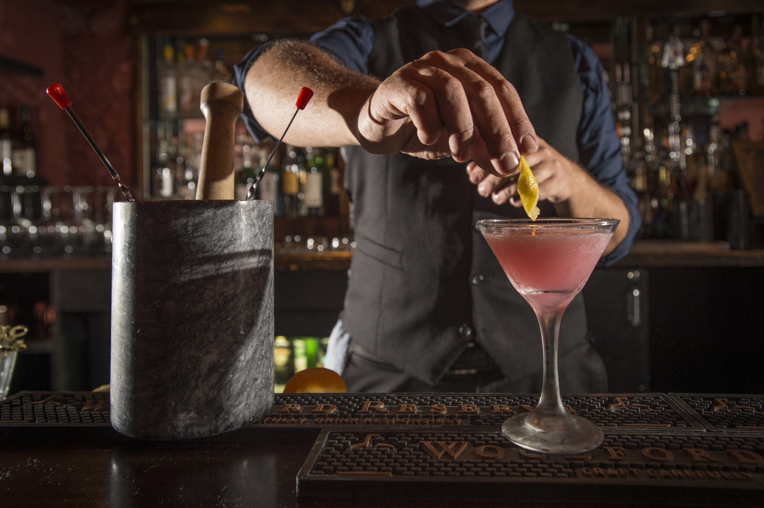 a person making a drink