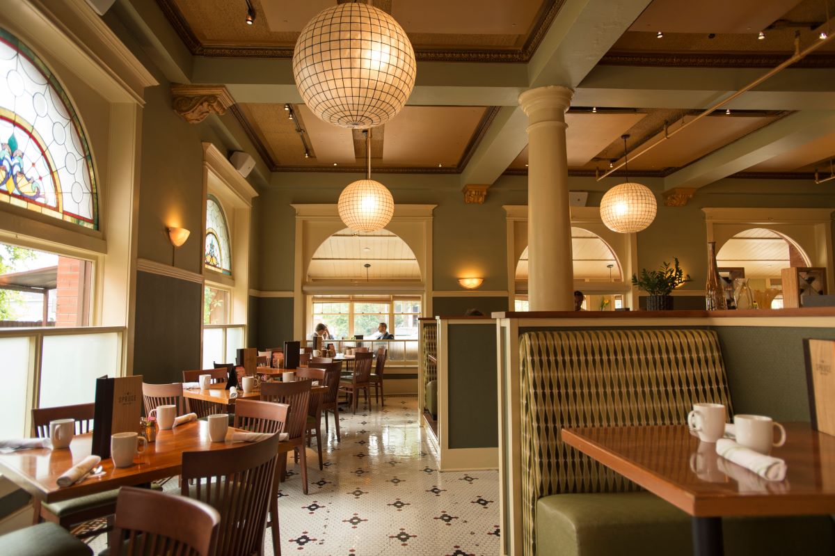 a restaurant with tables and chairs