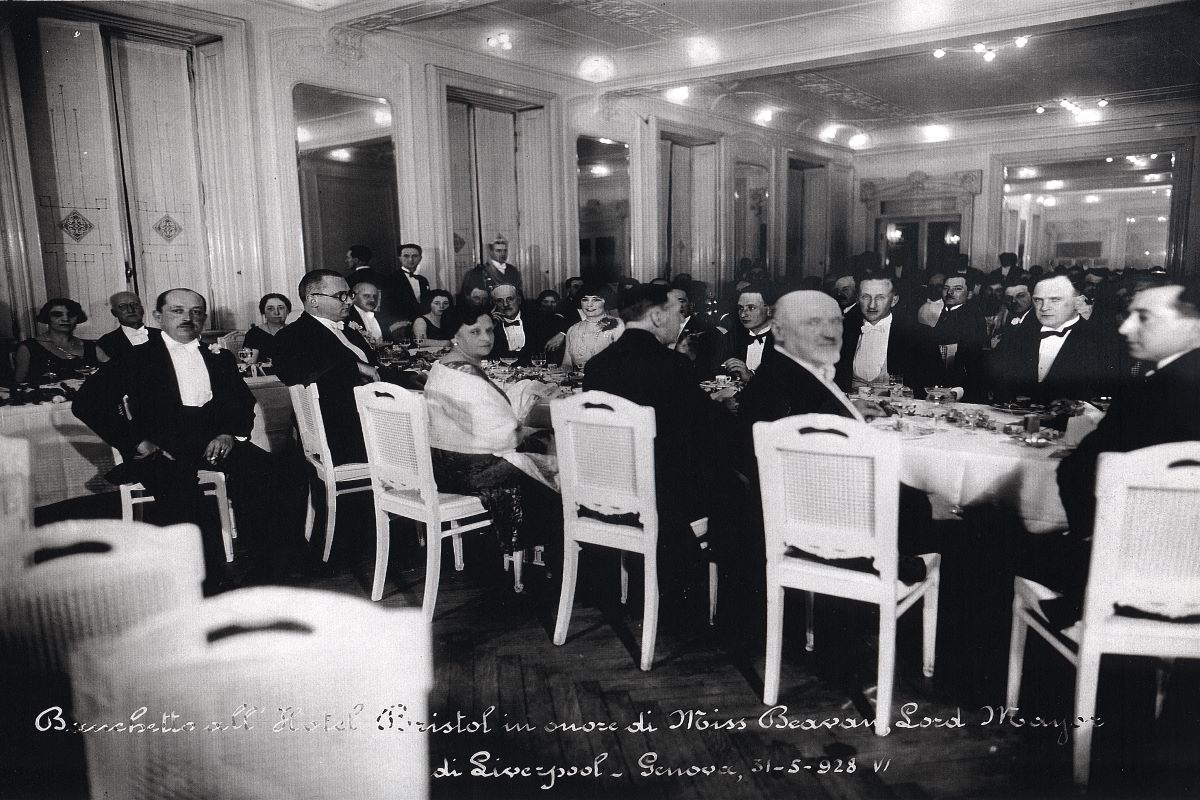 a group of people sitting at tables