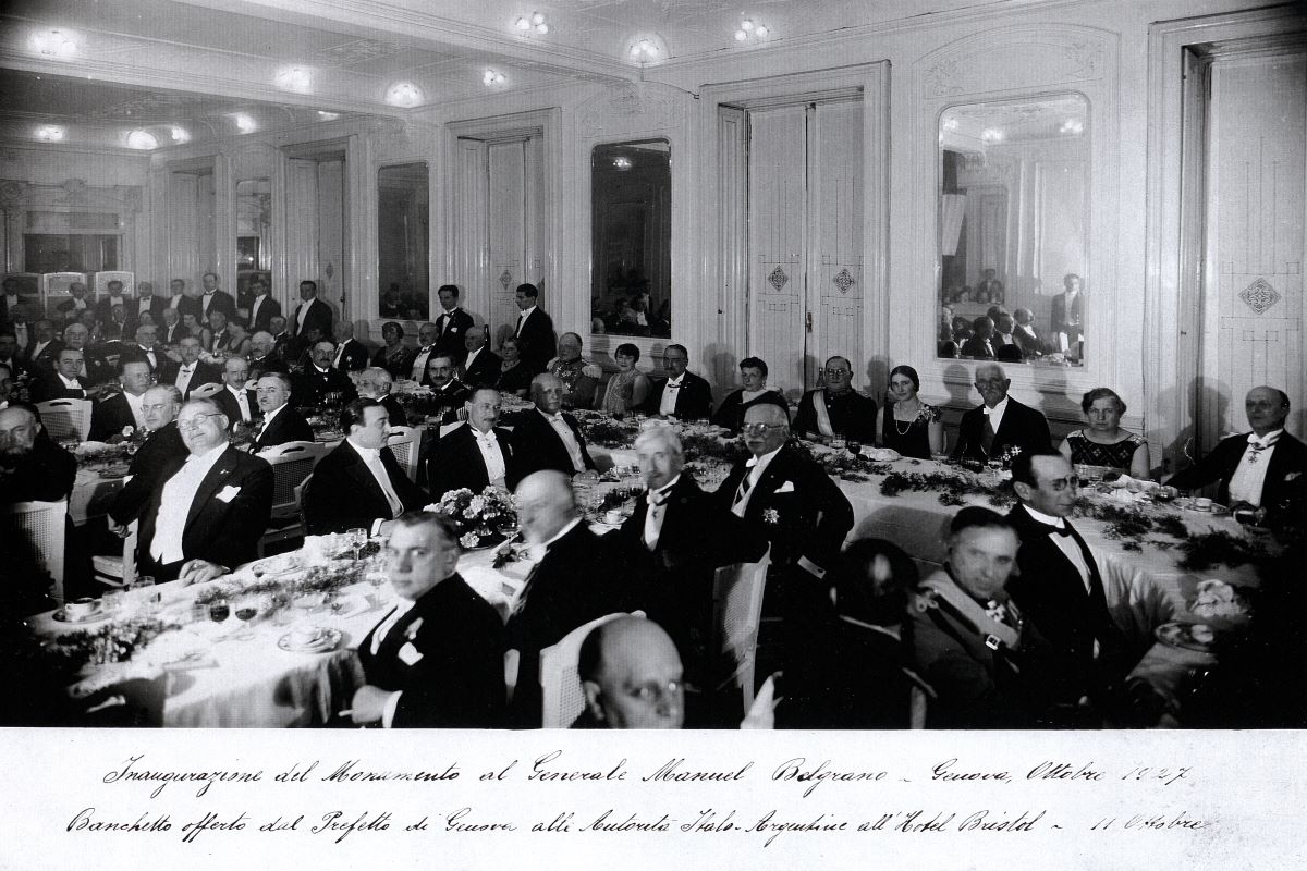a group of men sitting at tables