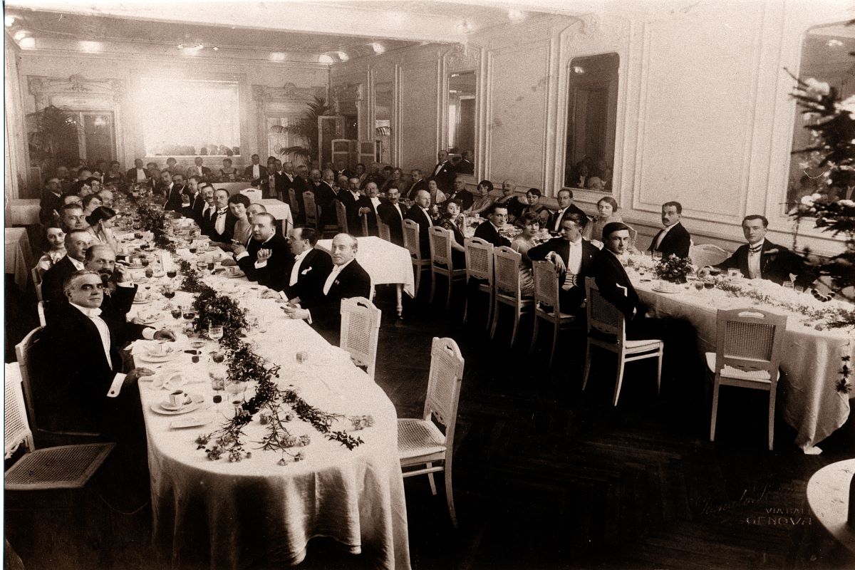 a group of people sitting at tables