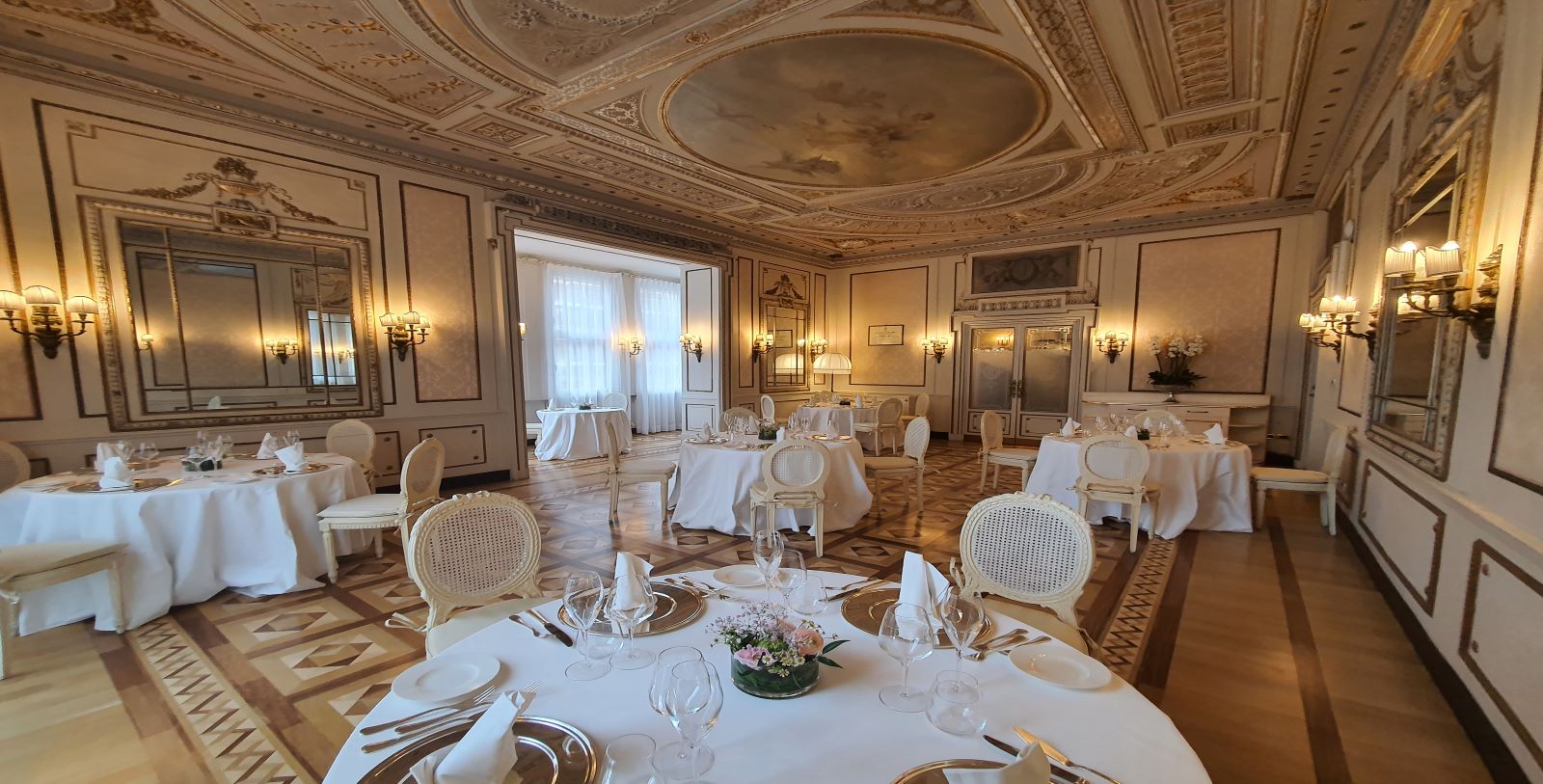 a room with tables and chairs