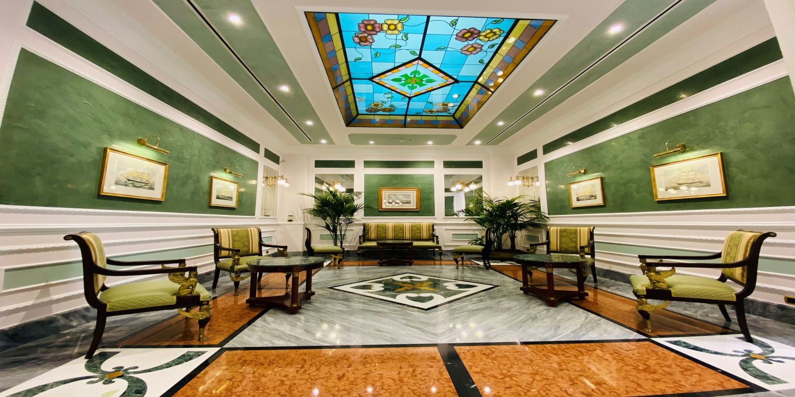 a room with a stained glass skylight