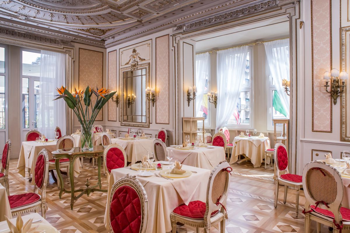 a room with tables and chairs