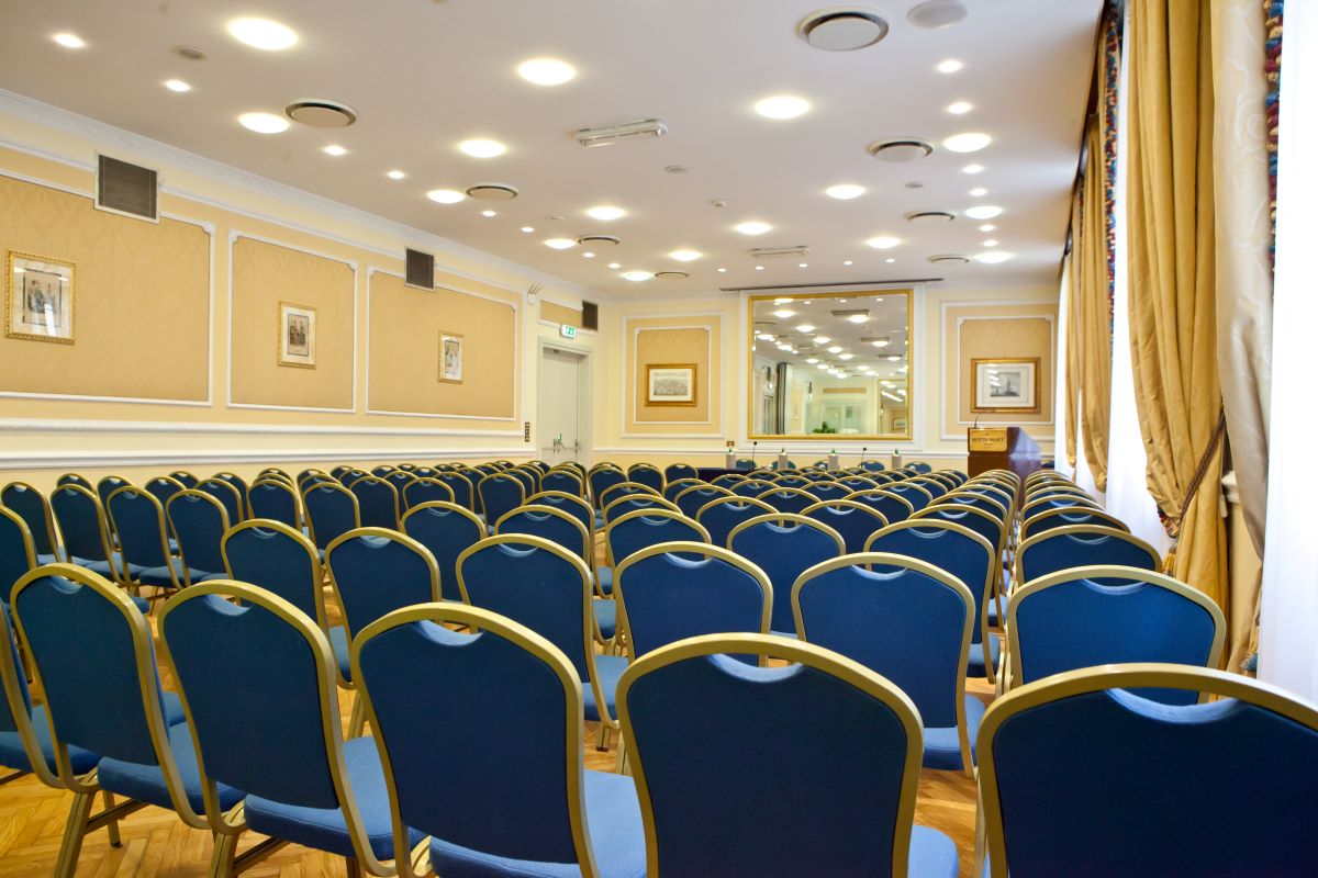 a room with blue chairs