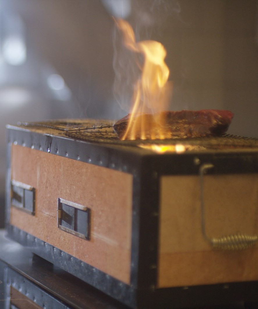 a fire on a grill