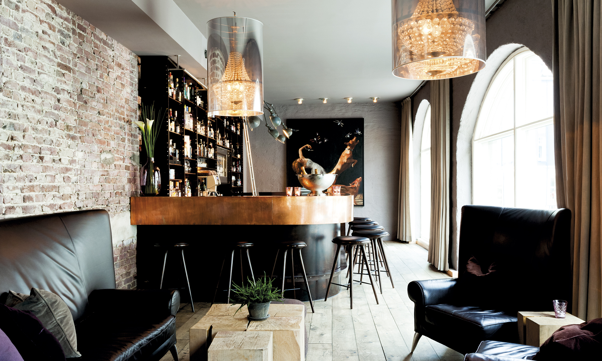 a bar with a bar and chairs