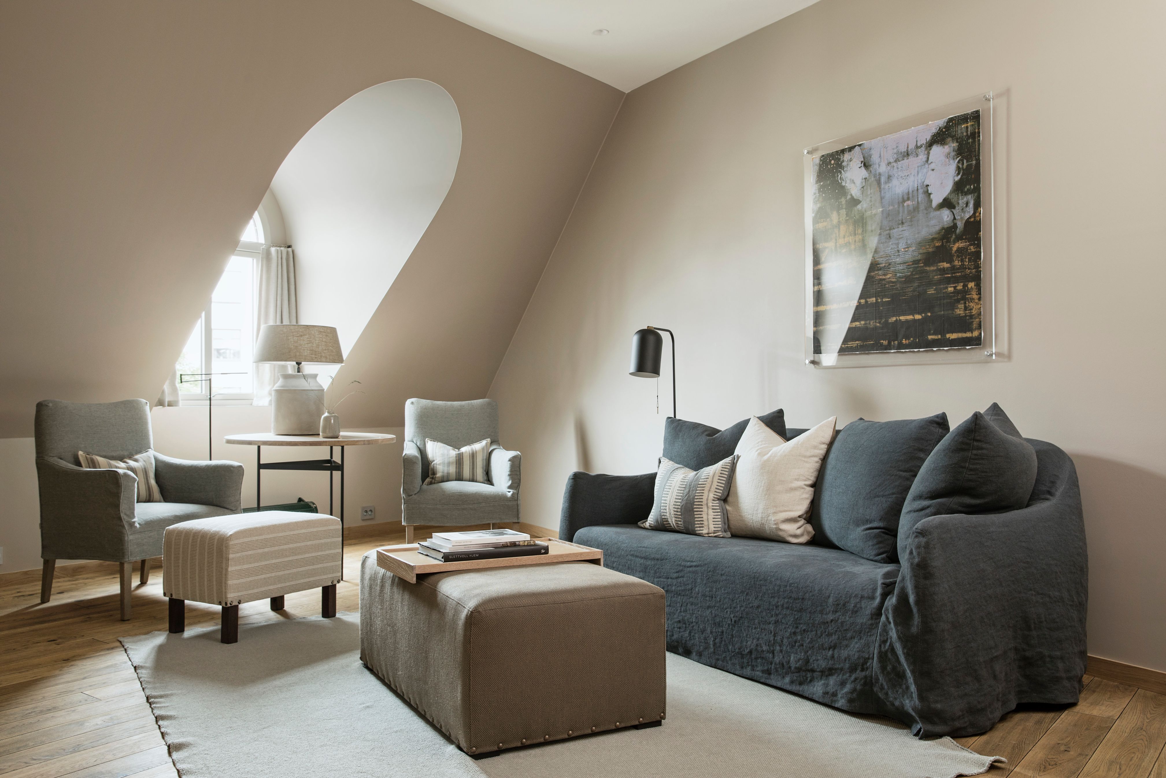 a living room with a couch and a table