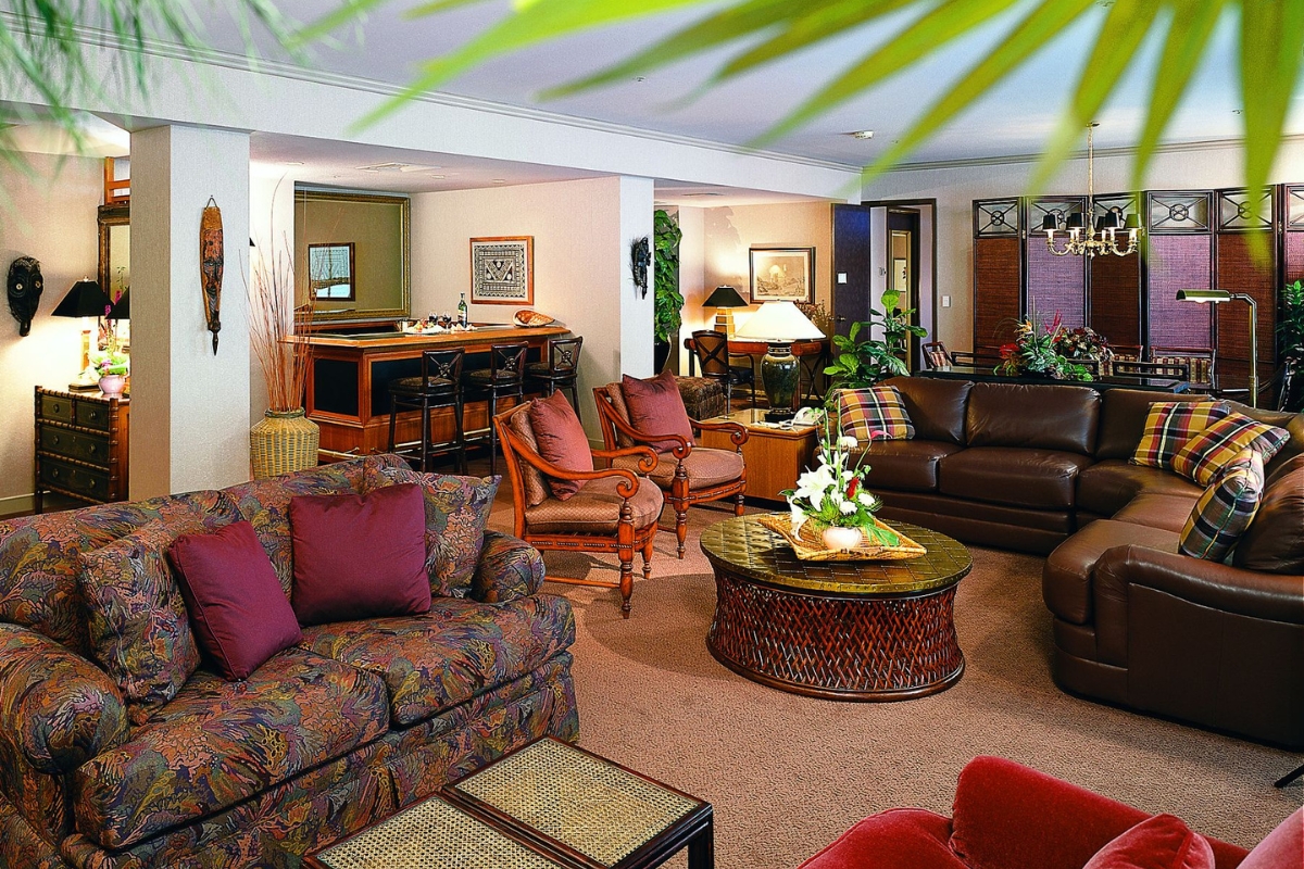 a living room with furniture and a table