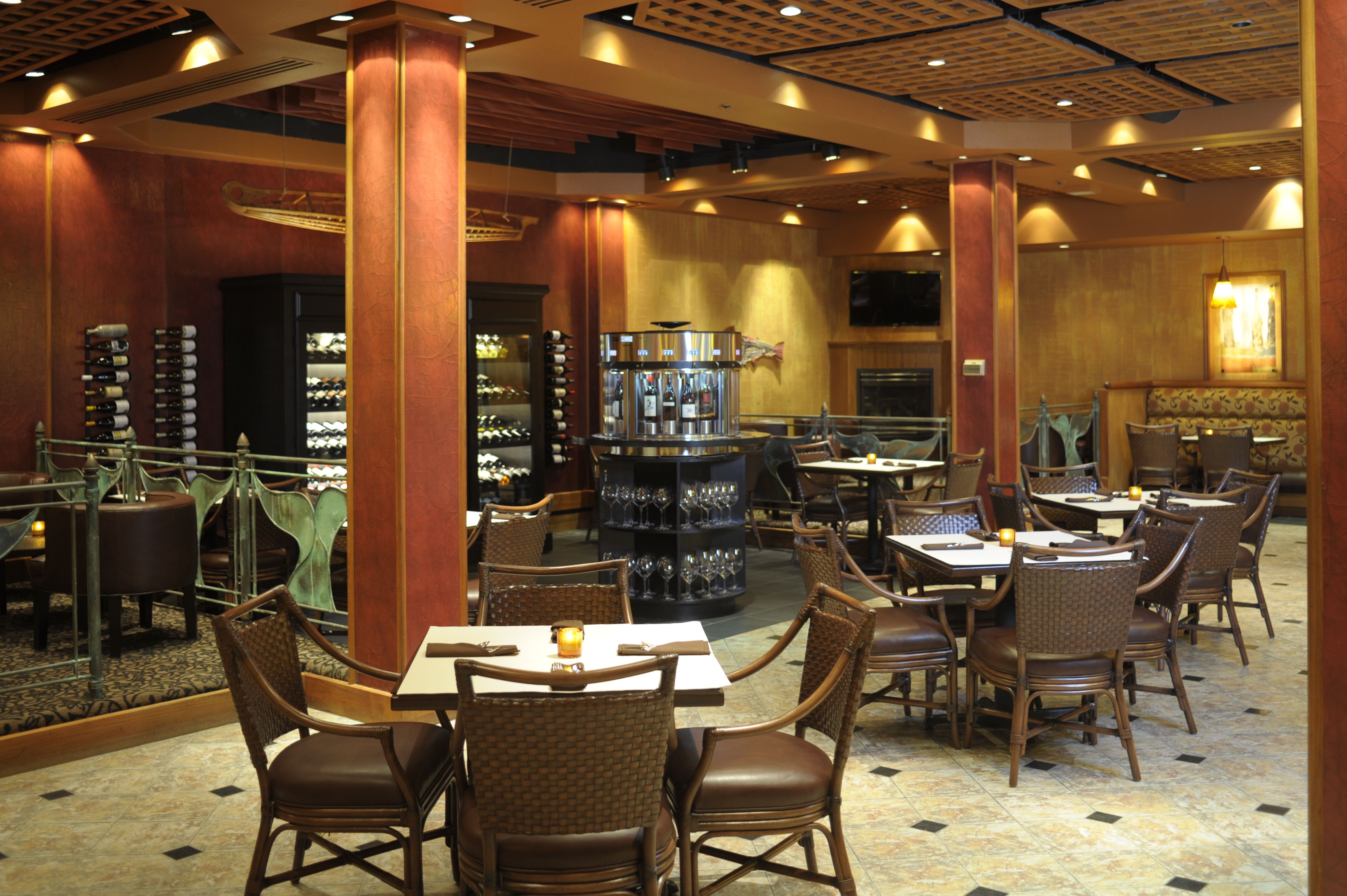 a restaurant with tables and chairs