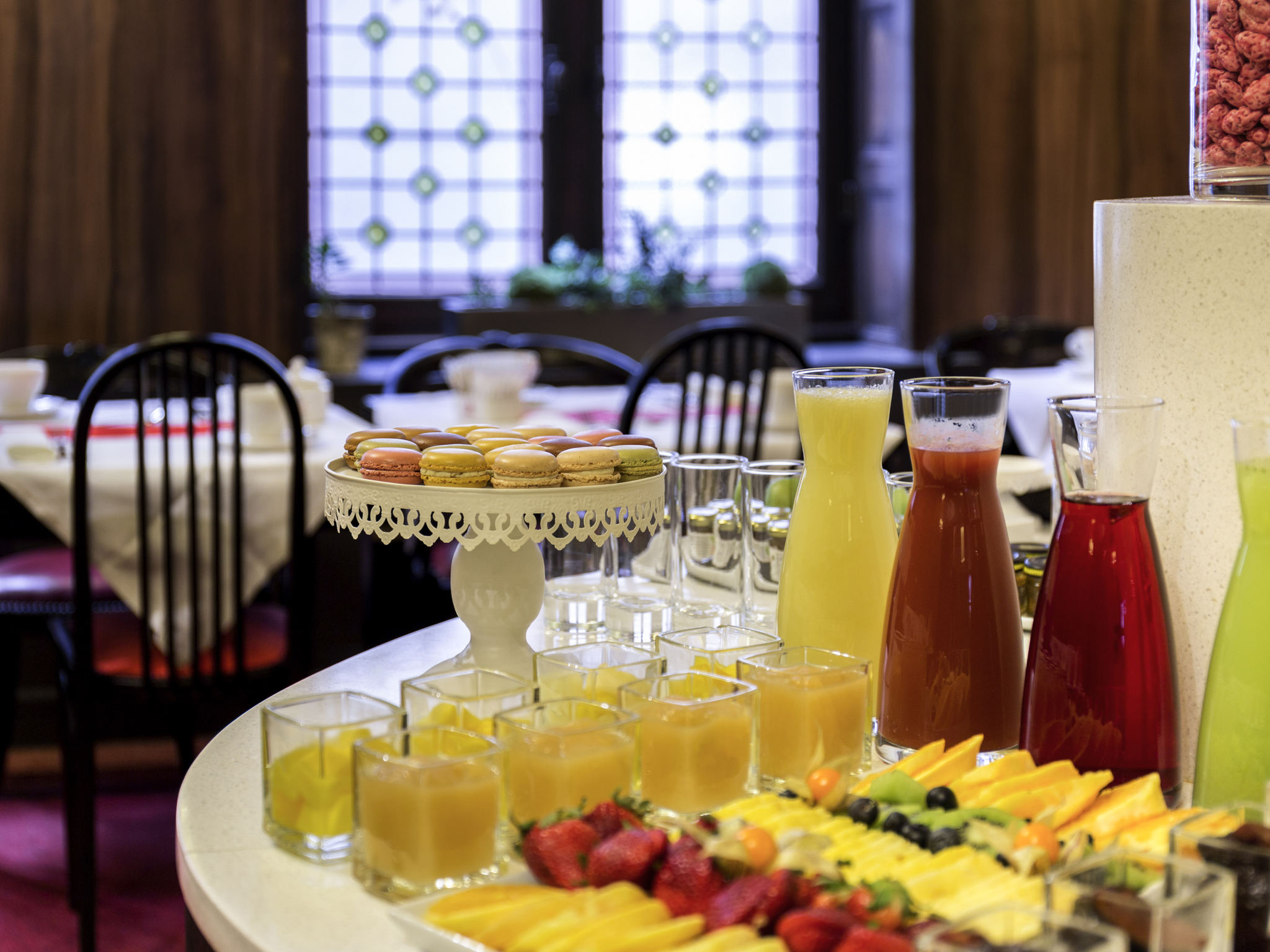 a table with fruit and drinks on it