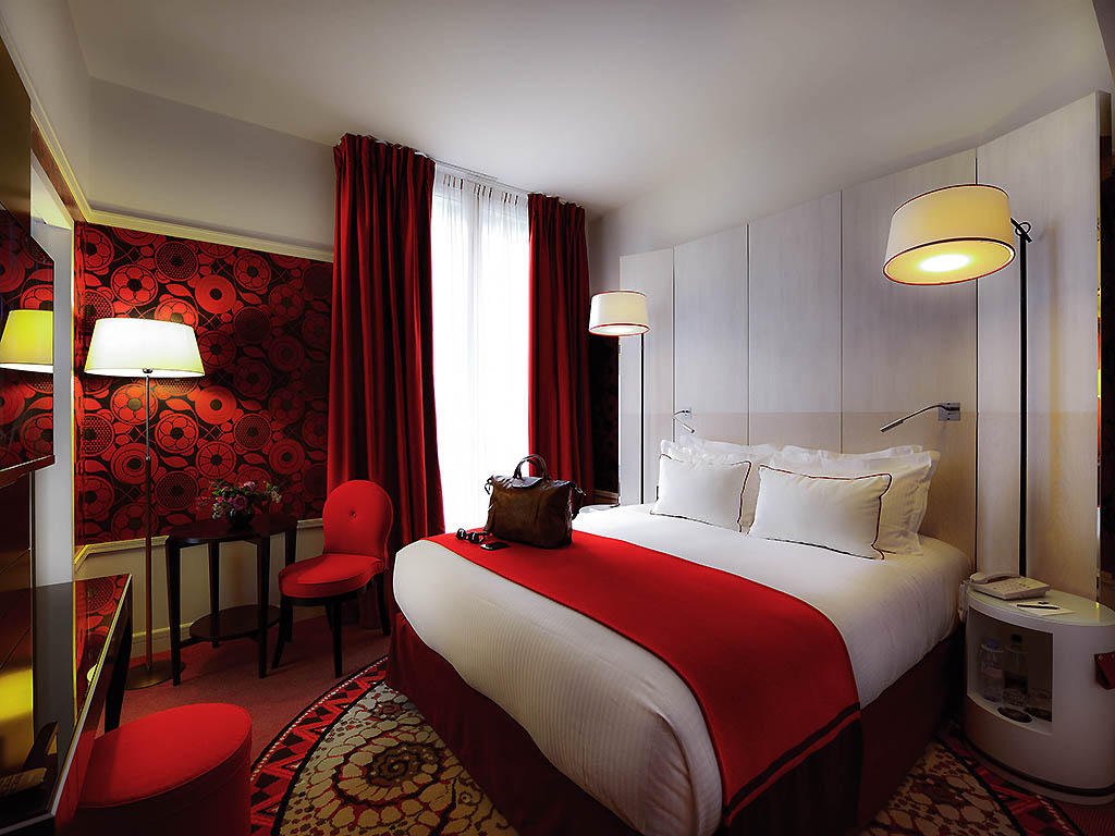 a room with a bed and a chair