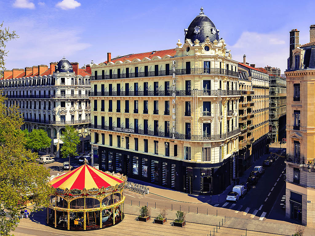 a carousel in front of a building