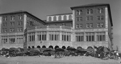 a building with many umbrellas