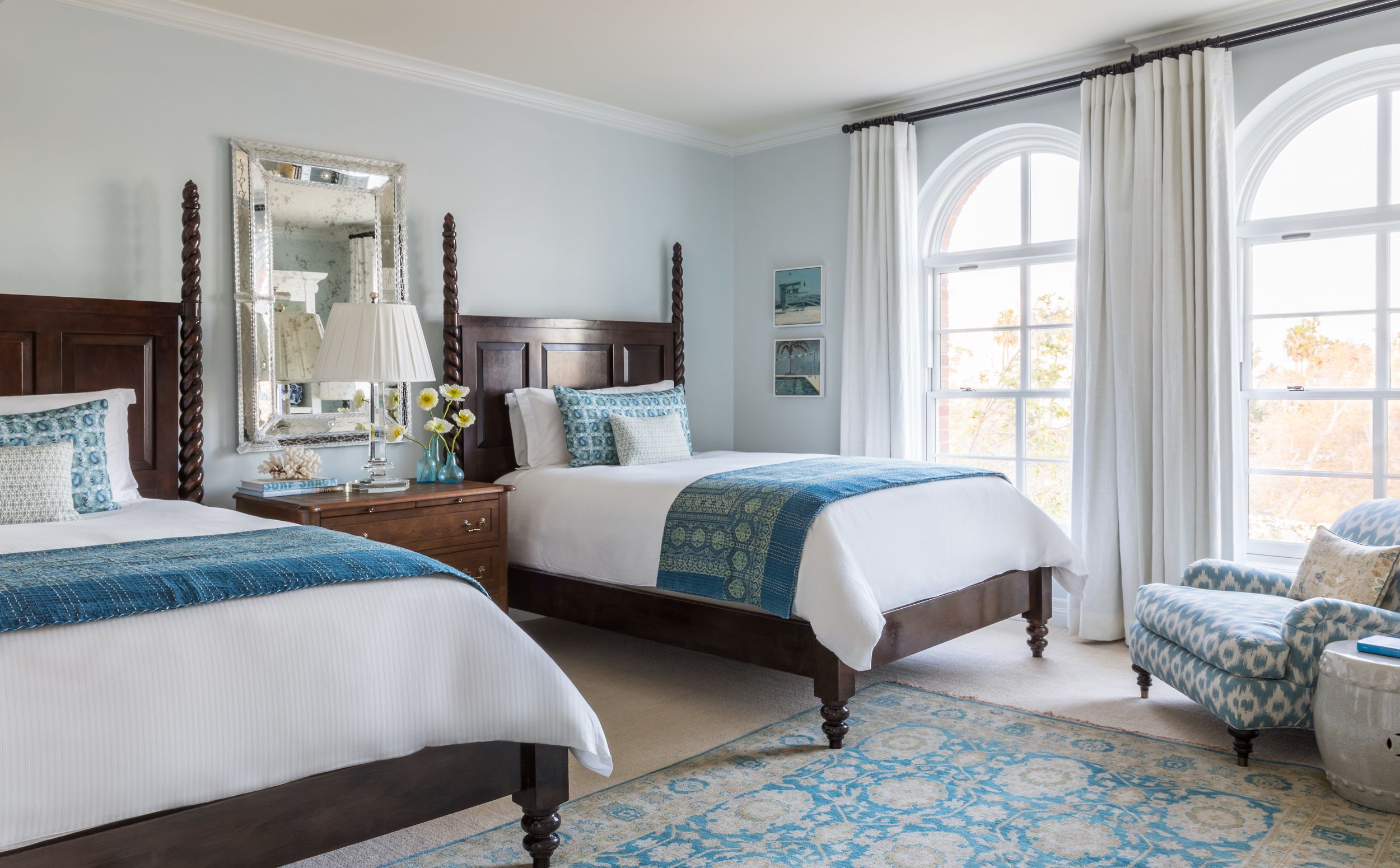 a bedroom with two beds