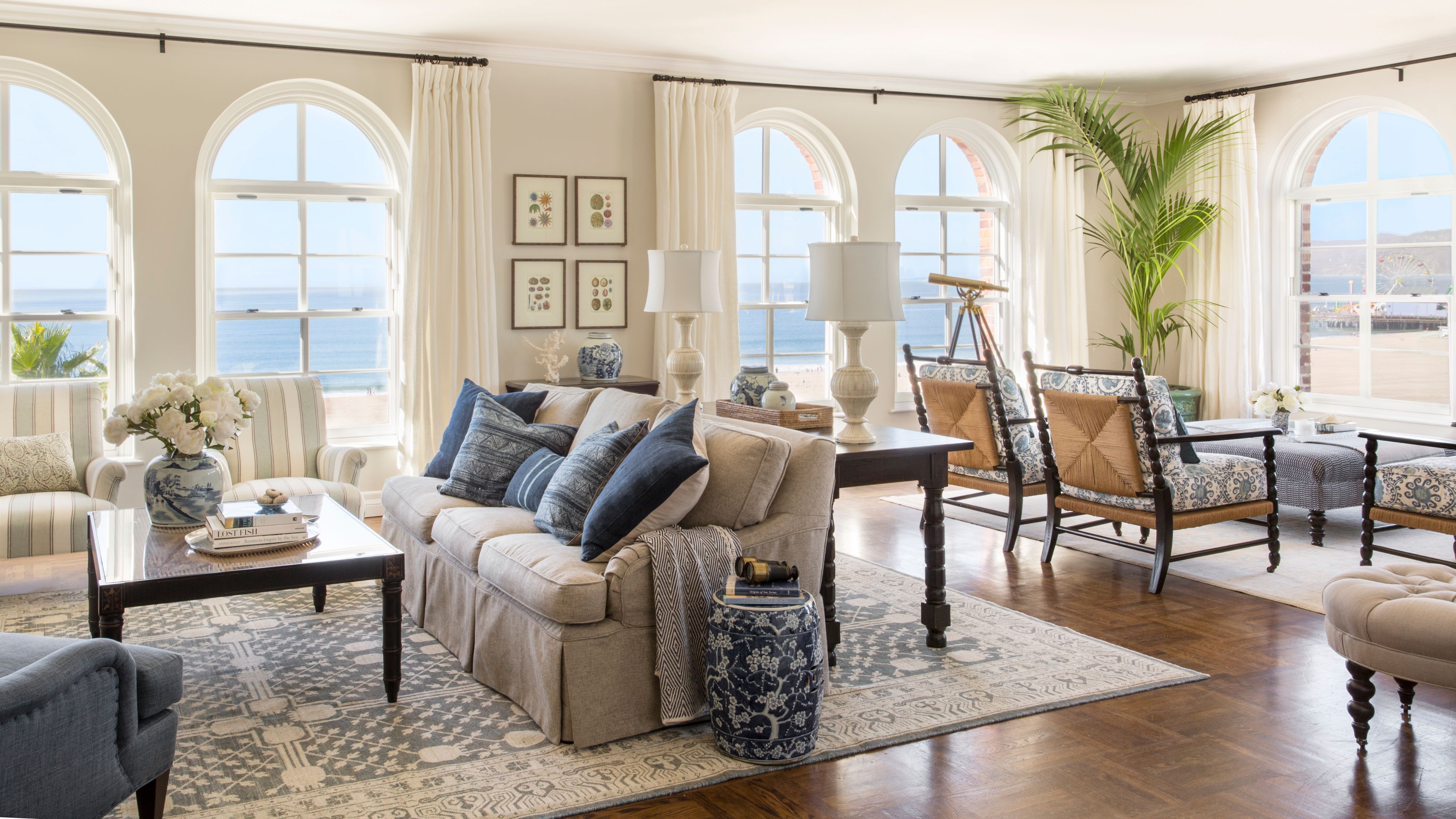 a living room with a couch and chairs