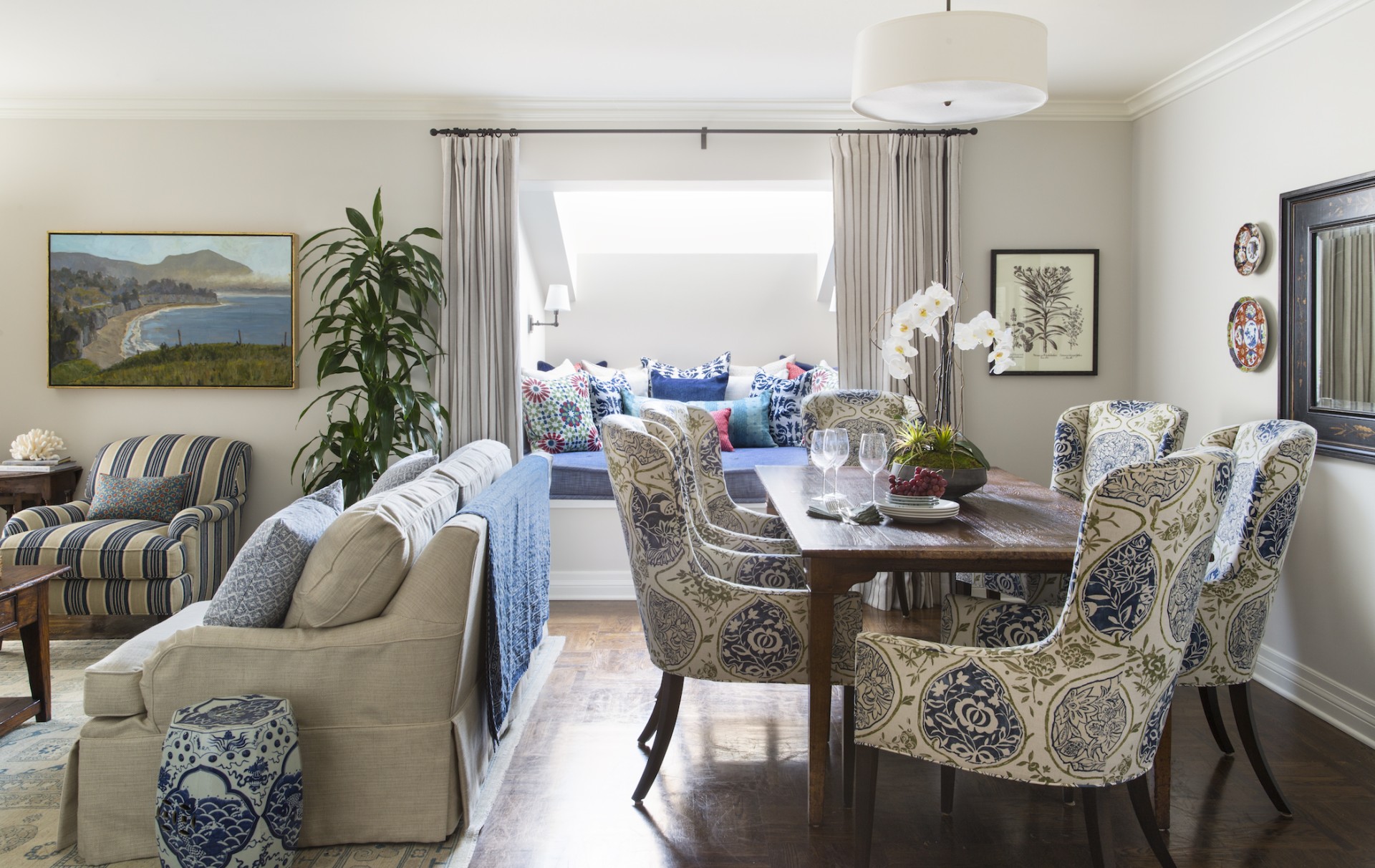 a dining room with a table and chairs