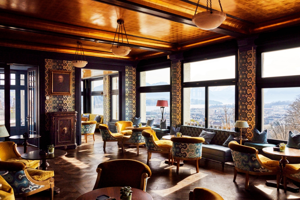 a room with chairs and tables