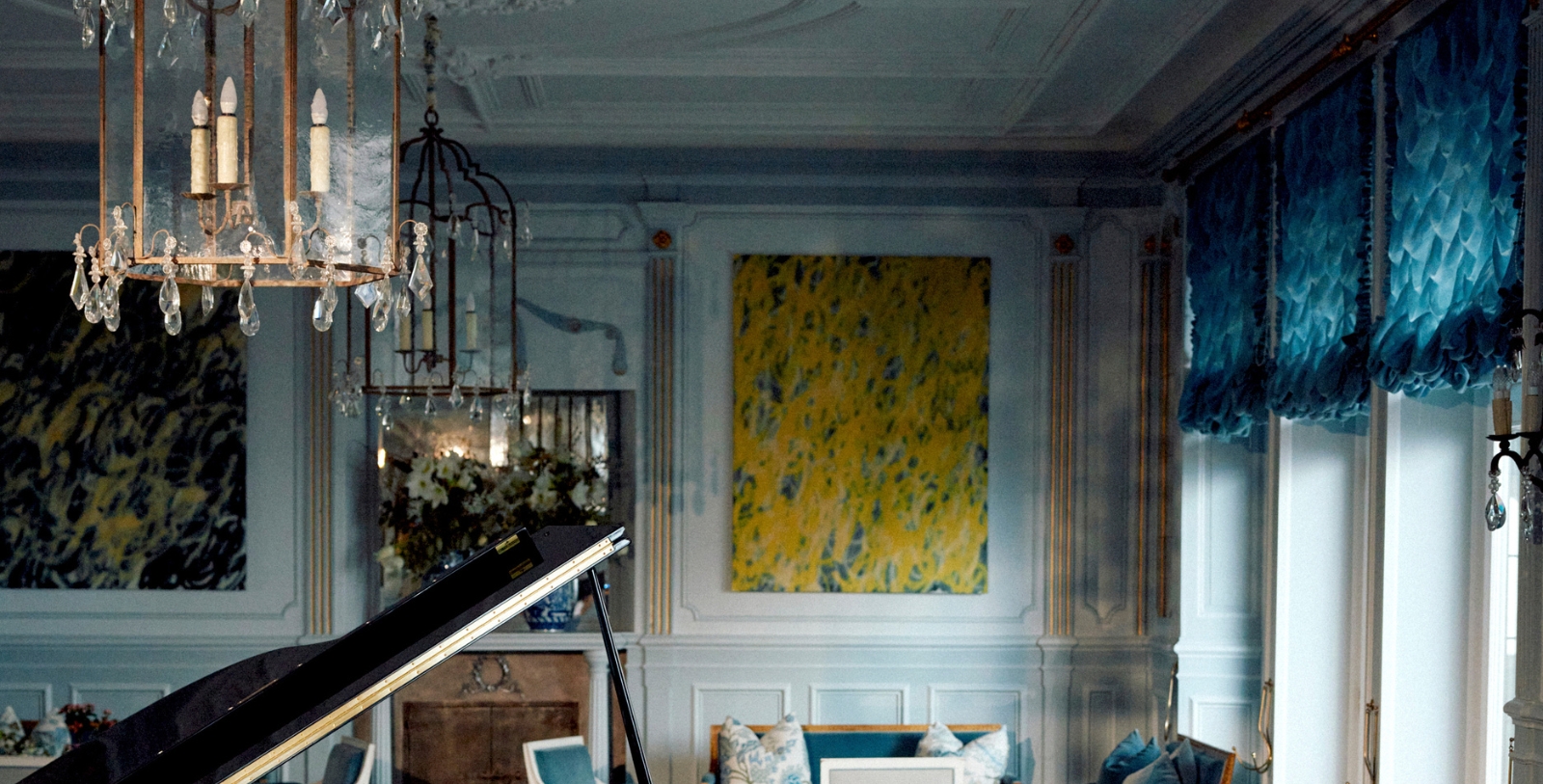 a room with a painting on the wall