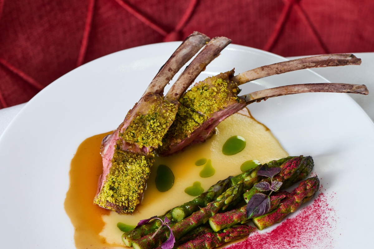 a plate of food on a red surface