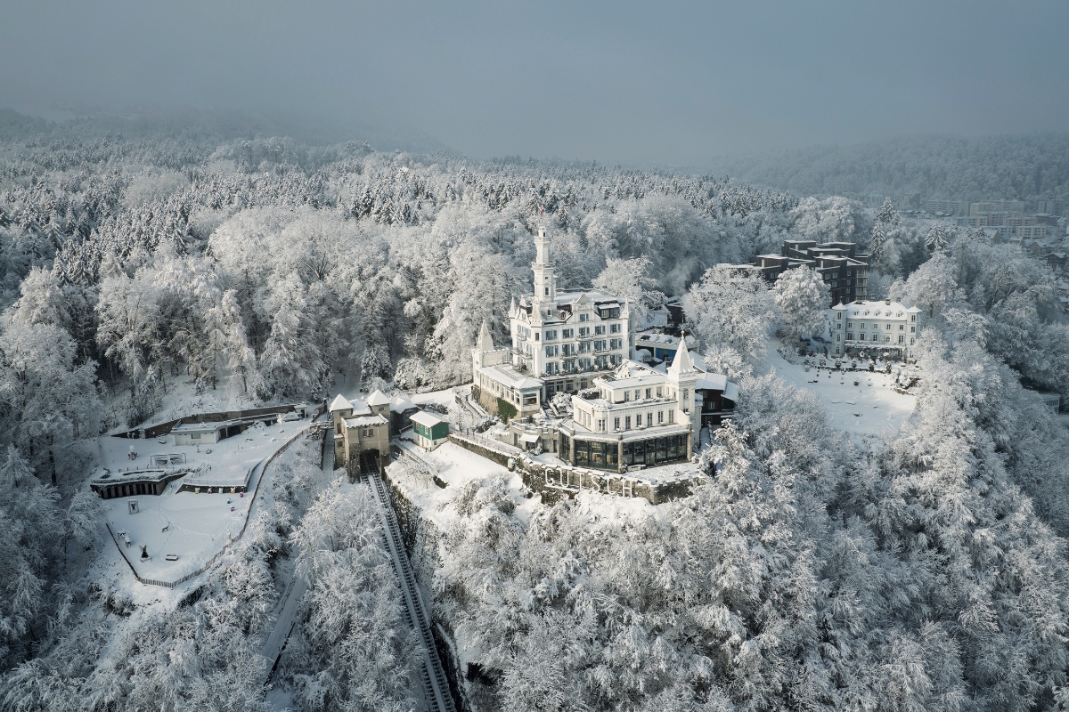 a building surrounded by snow