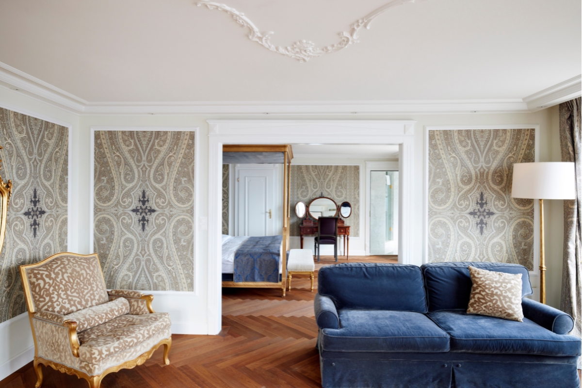 a room with a couch and a mirror