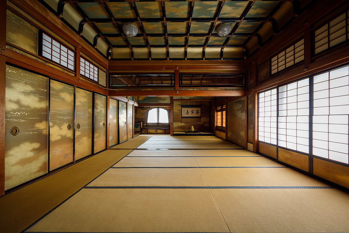 a room with a large floor and windows