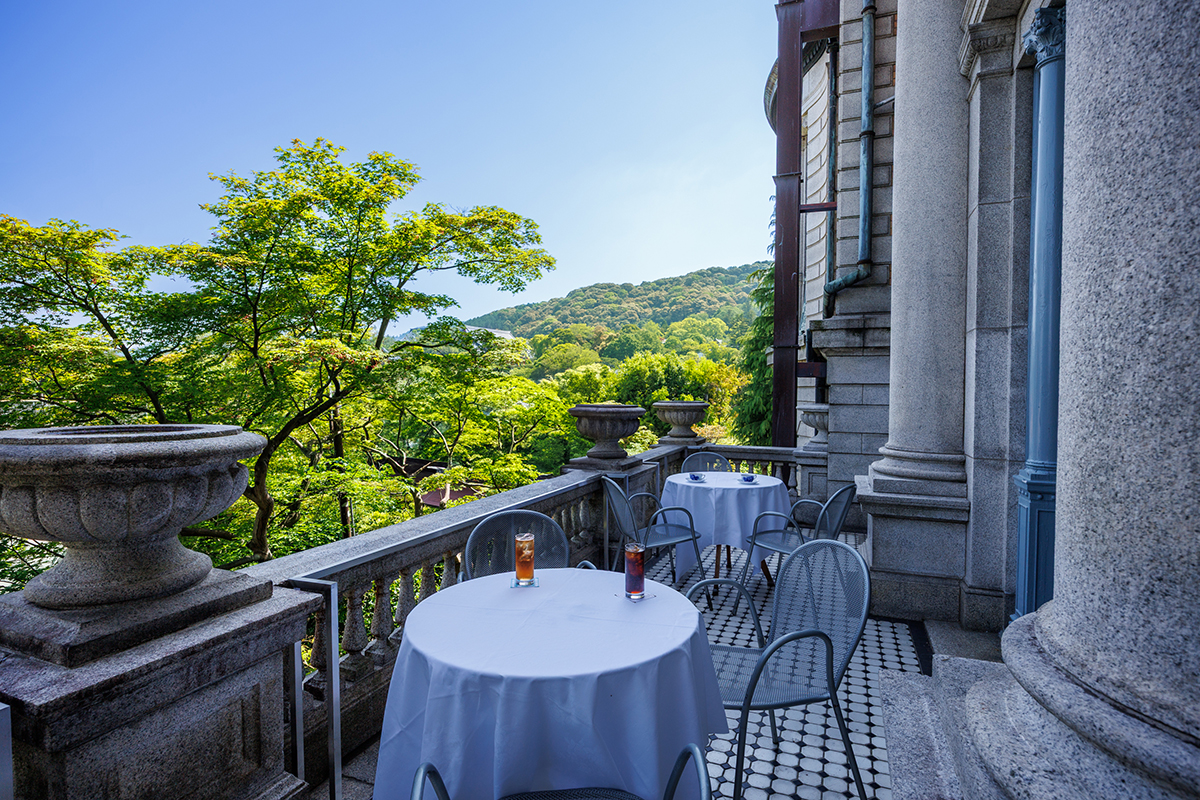 a table and chairs on a balcony