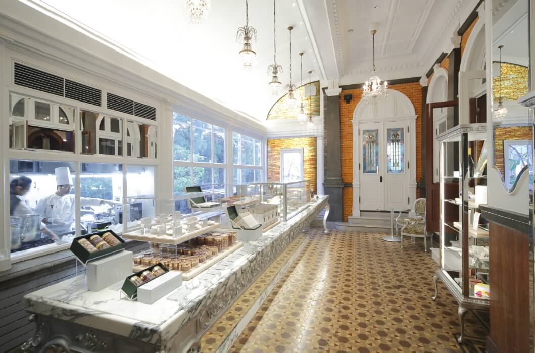 a store with a counter and a glass door