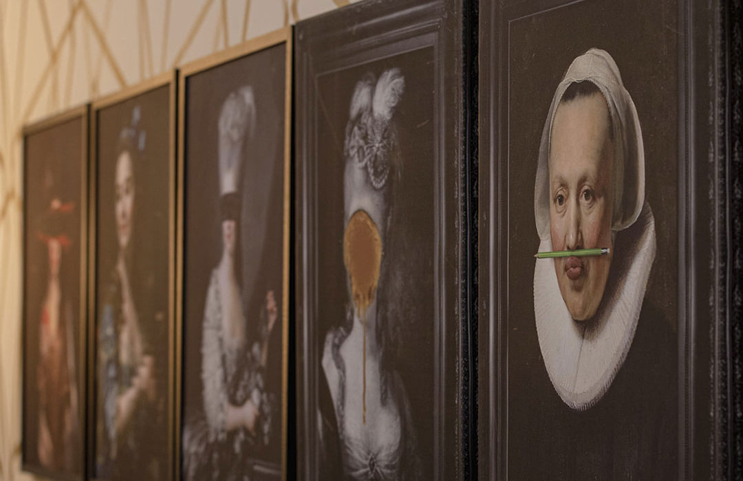 a group of art pieces on a wall