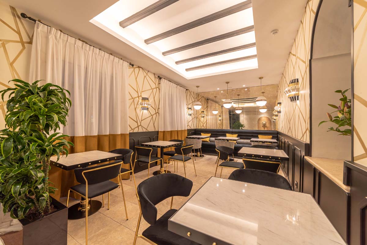 a room with tables and chairs