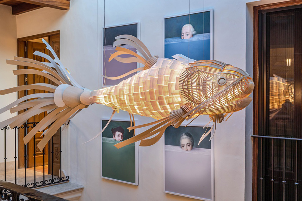 a fish sculpture from a ceiling